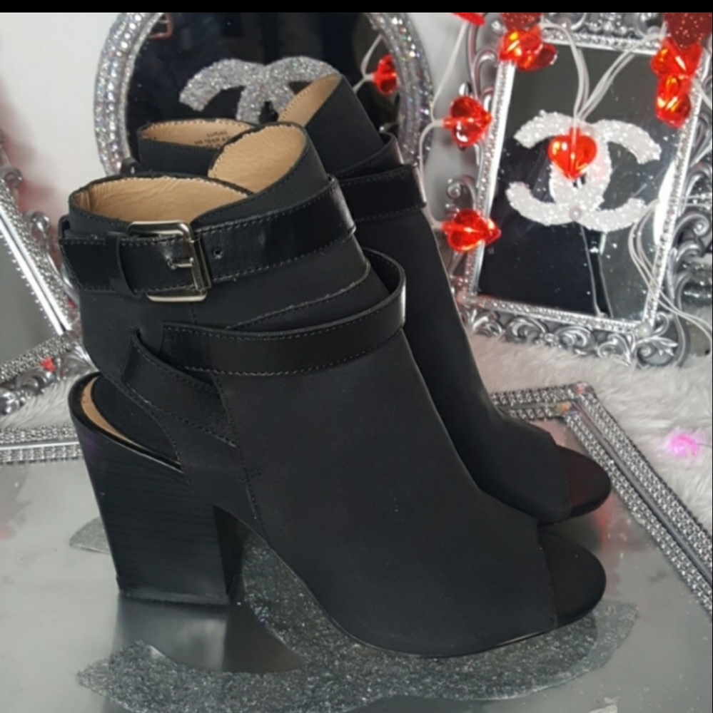 Black open toe bootie and open back.